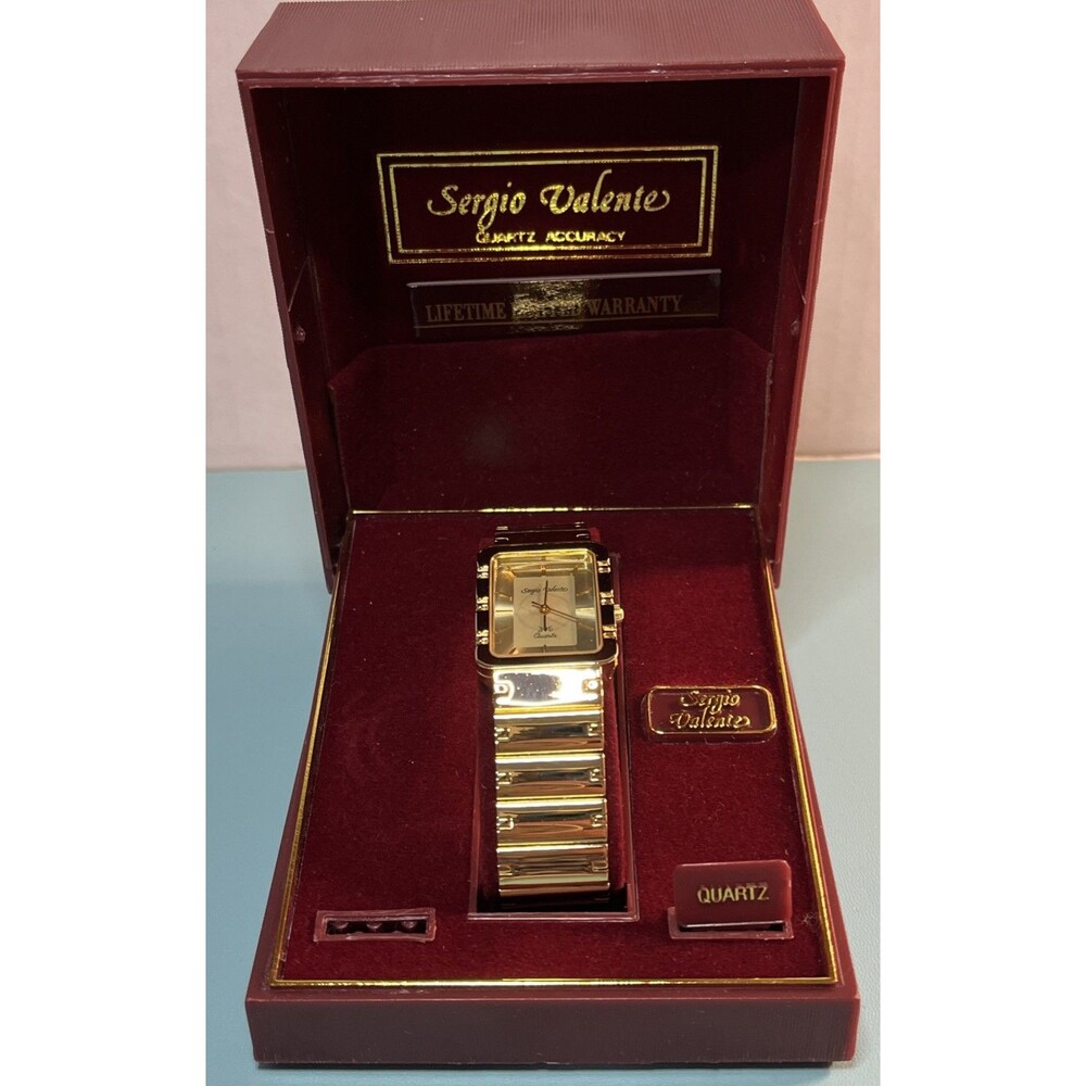 Vintage Sergio Valente Gold Tone Mens Quartz Watch in original Box